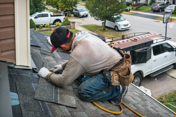 Professional Gutter Repair And Installation technician working in Smithville, OH